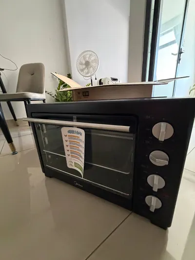 Новая электрическая духовка Midea 40 л - не использованная