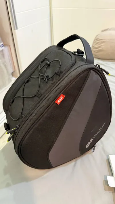 Multi-item lot: Givi motorcycle bag, games, iron, dryer, yoga set