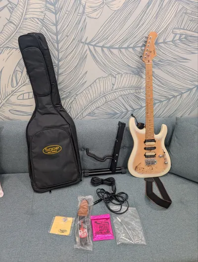 Bán đàn guitar điện Sqoe SEIB 550 – bộ đầy đủ với phụ kiện