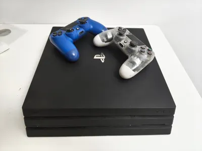 PlayStation 4 Pro (7006B) с играми