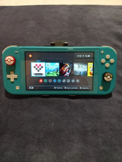 Nintendo Switch Lite – прошитая версия, можно скачивать и играть в любые игры