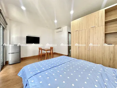 Fully furnished studio with balcony, city center, 8.2M VND/month — 2/3