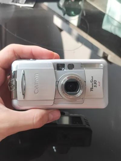 Multi-item sale: Panasonic Lumix, Canon PowerShot, manga + merch, Nintendo 3DS — 4/5