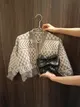Handbag and crop-top sweater set, 350,000 VND