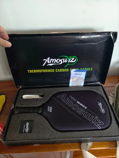 Two pickleball paddles for sale (JOOLA and Amoswiz)