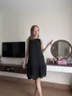 Three clothing items for sale (black dress, cargo skirt, cotton sundress)