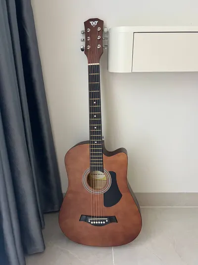 Guitar with case for sale, 500K VND