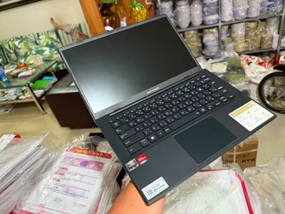 Asus Vivobook Go E1404FA laptop for sale (Ryzen 5, 16GB RAM, 256GB SSD) — 4/7