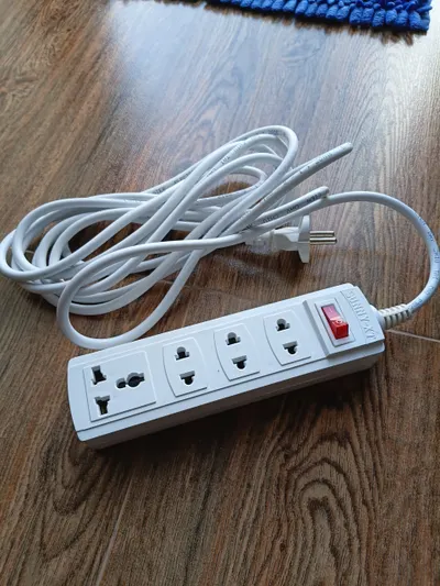 Household items for sale: metal coat rack, raincoats, extension cord, frying pan (4 items) — 3/4