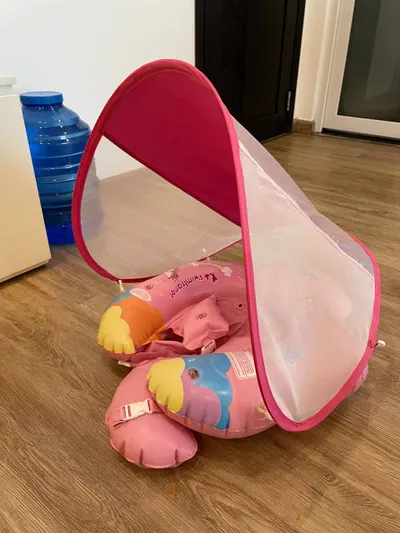 Kids items for sale: inflatable cot, potty, float ring — 2/3