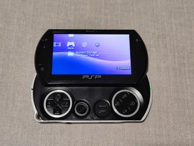Multi-item sale: PSP GO, manga box set, two cameras — 3/10