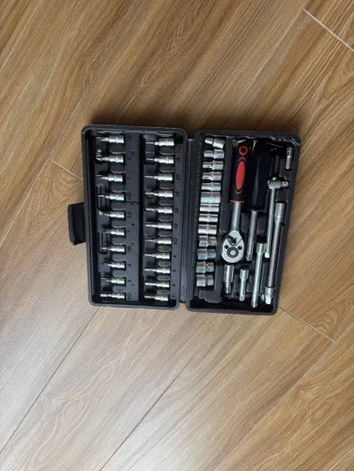Household items for sale: table, armchair, vase, tool set, drying rack — 4/5