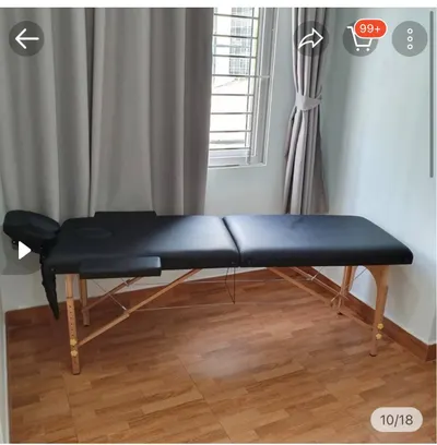 Almost new massage couch with adjustable legs