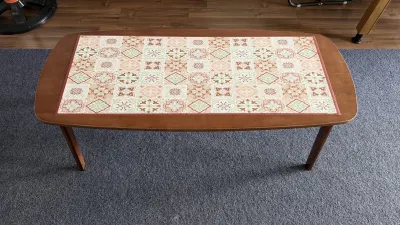 Wooden oval coffee table with folding legs