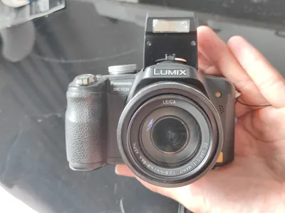 Multi-item sale: Panasonic Lumix, Canon PowerShot, manga + merch, Nintendo 3DS — 2/5