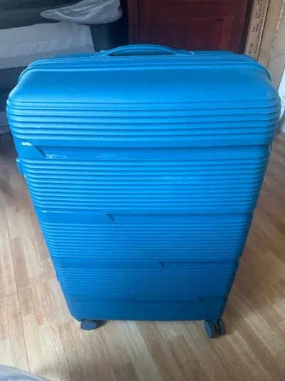 XL suitcase 75x30x50 cm, turquoise, 1,200,000 VND