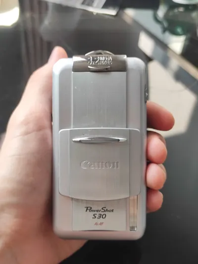 Multi-item sale: PSP GO, manga box set, two cameras — 10/10