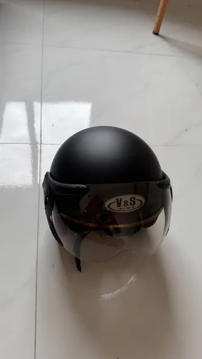 Used household items for sale: massage table, lamp, raincoats, helmets, vacuum, steamer — 9/10