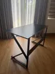 Household items for sale: table, armchair, vase, tool set, drying rack